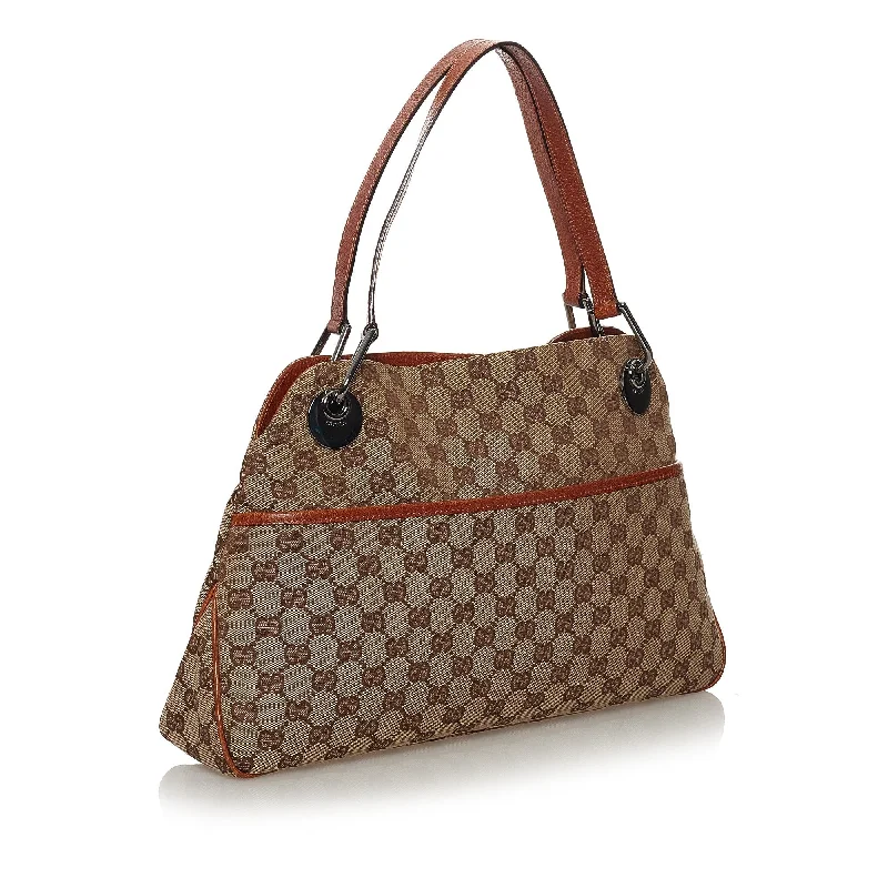 Ladies Gucci Dionysus bags in a pastel colorGucci GG Canvas Eclipse Shoulder Bag (34757)