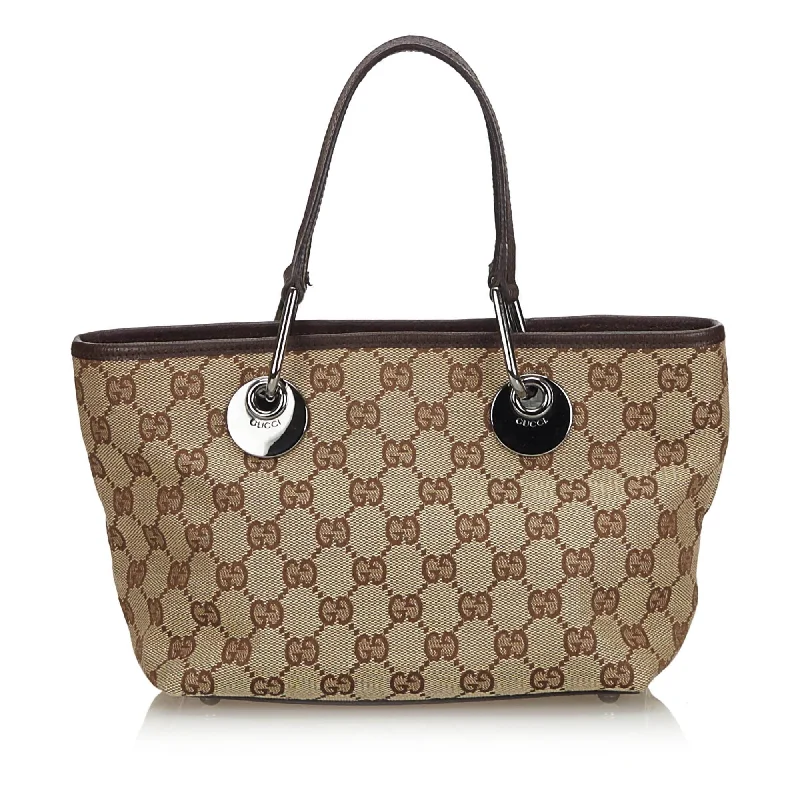 Ladies Gucci shoulder bags with a magnetic - closure flapGucci Brown Beige Canvas Fabric GG Eclipse Tote Bag Italy