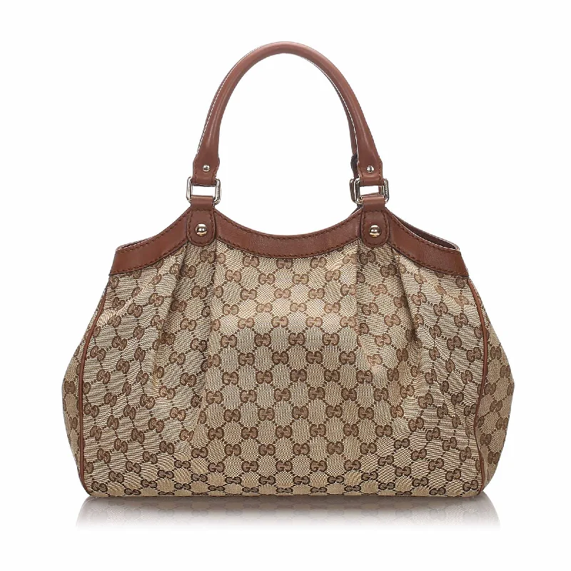 Women Gucci bags with interlocking G hardware for a classic lookGucci Brown Canvas Fabric Guccissima Sukey Tote Italy