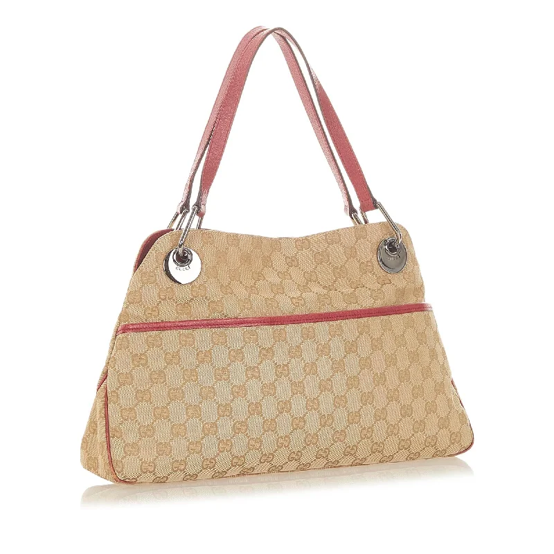 Women Gucci bags with interlocking G hardware for a classic lookGucci GG Canvas Eclipse Shoulder Bag (20325)