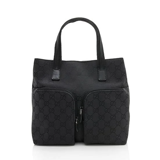 Gucci backpacks for women with a sleek silhouetteGucci GG Canvas Leather Double Pocket Mini Tote