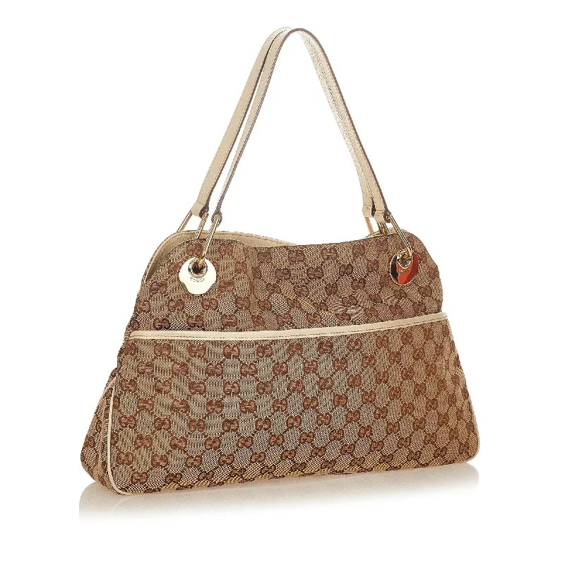 Women Gucci Sylvie bags with a crystal - embellished web stripeGucci GG Canvas Eclipse Shoulder Bag (24433)