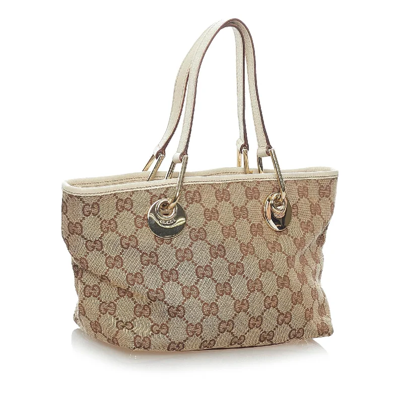 Gucci Marmont bags for women with gold - toned hardwareGucci GG Canvas Eclipse Handbag (32960)