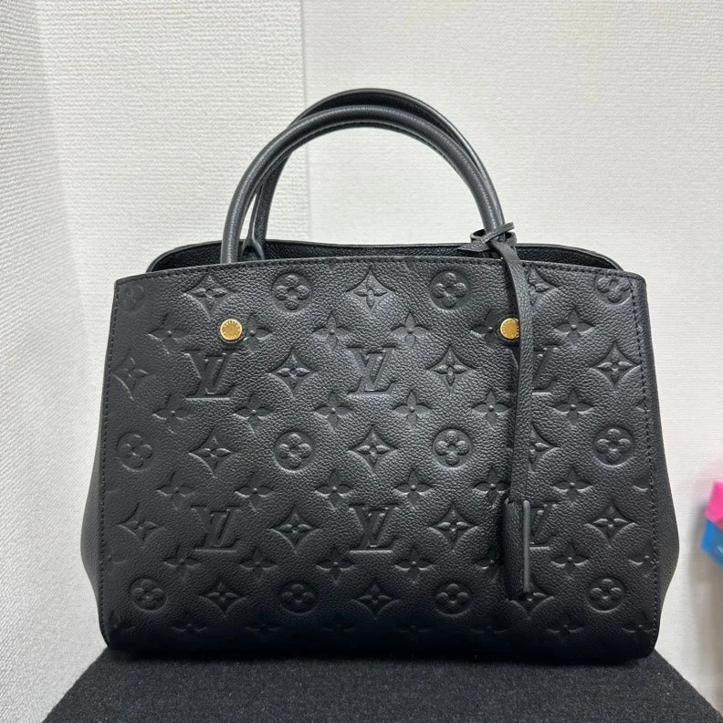 Louis Vuitton bags with a chain - link trim and a leather body for a modern edgeLouis Vuitton Monogram Empreinte Montaigne MM Bag,Black,Leather