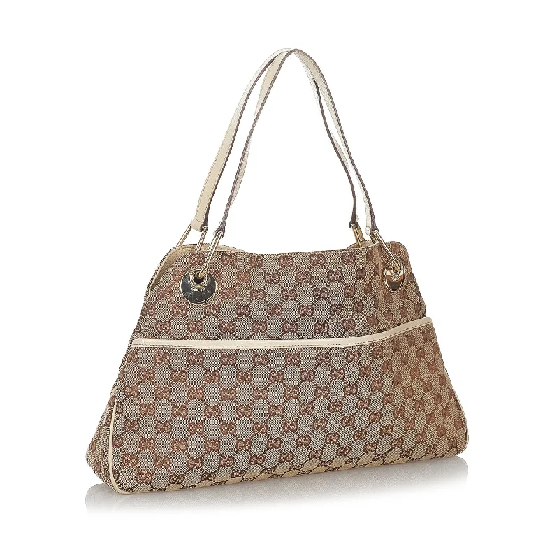 Ladies Gucci shoulder bags with a magnetic - closure flapGucci GG Canvas Eclipse Shoulder Bag (26946)