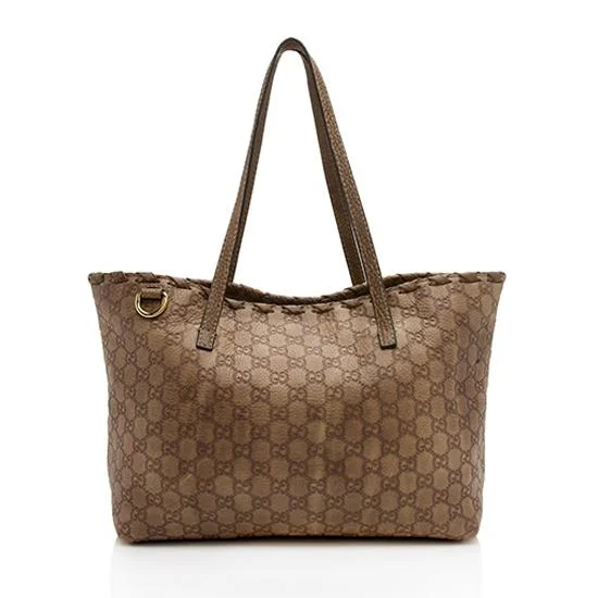 Gucci Marmont bags for women with a contrast - colored interiorGucci Guccissima Leather Bamboo Tassel Tote - FINAL SALE