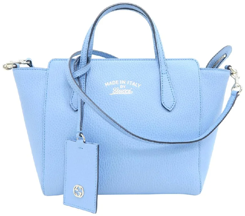 Women Gucci bags with a chain - link trim and a leather bodyGucci Swing Mini Blue Calfskin Tote