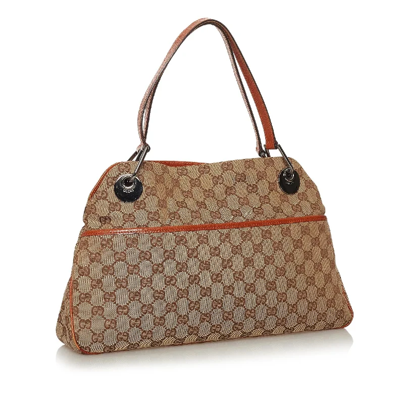 Women Gucci crossbody bags with a keychain holderGucci GG Canvas Eclipse Shoulder Bag (29205)