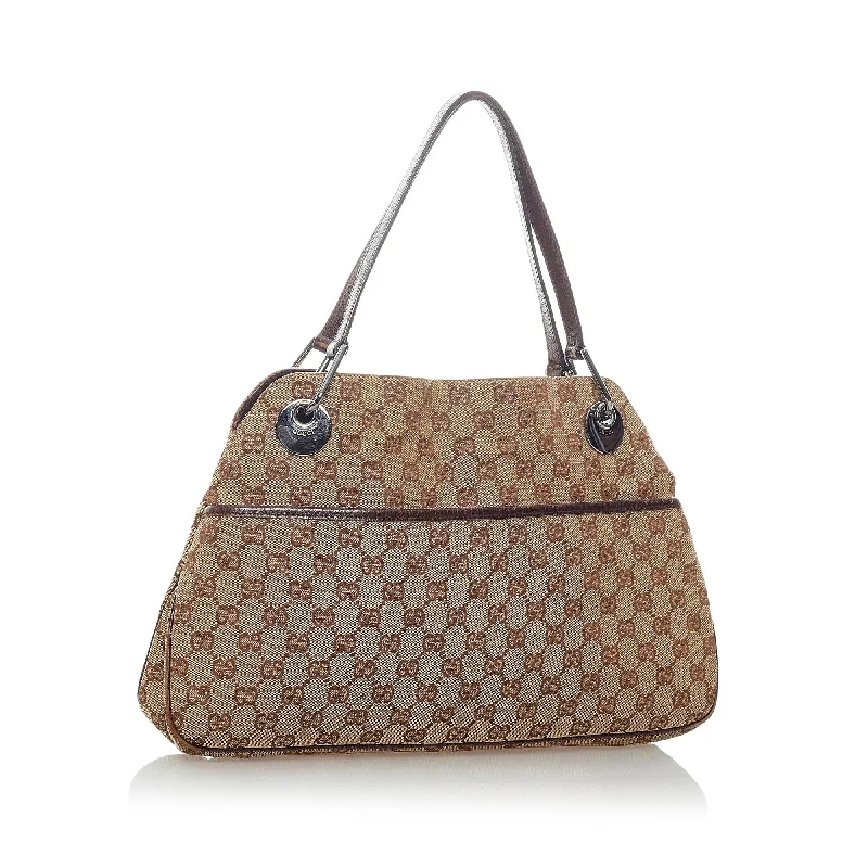 Ladies Gucci Dionysus bags with a detachable shoulder strapGucci GG Canvas Eclipse Shoulder Bag (32020)