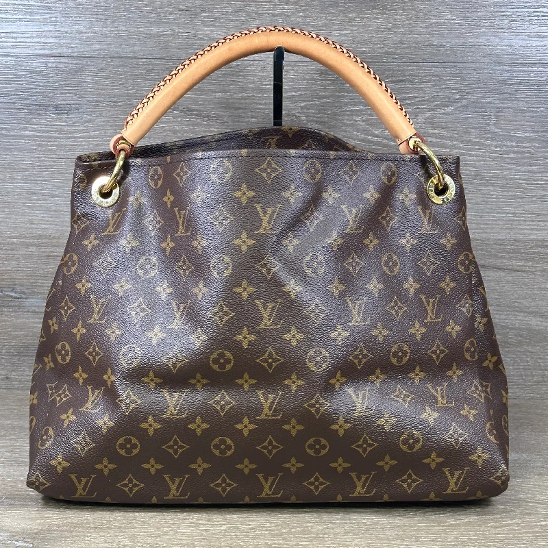 Louis Vuitton bags with a chain - link trim and a leather body for a modern edgeLouis Vuitton Monogram Artsy MM