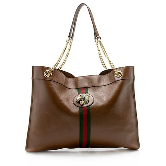 Women Gucci Sylvie bags featuring the signature web stripeGucci Leather Rajah Large Tote