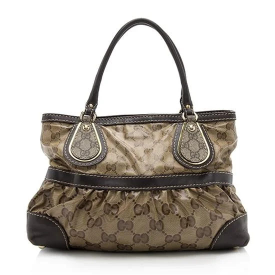 Women Gucci crossbody bags with a printed floral patternGucci GG Crystal Supreme Mix Tote