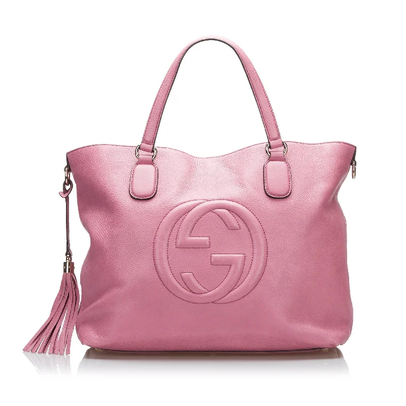 Women Gucci bags with a snap - button closure and a decorative charmGucci Soho Satchel