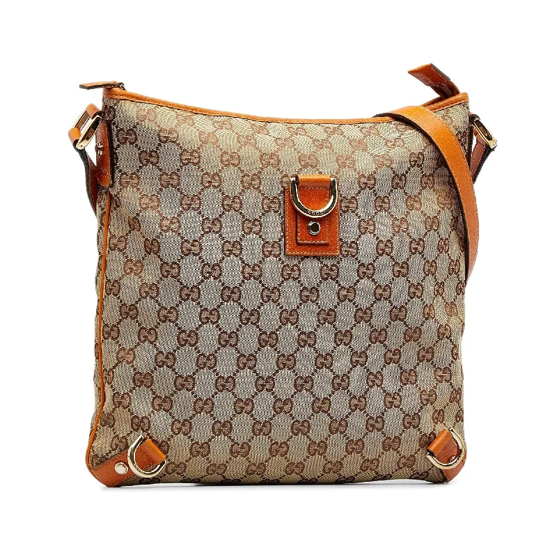 Women Gucci Sylvie bags with a monogram - embossed leatherGucci GG Canvas Abbey D-Ring Crossbody (SHG-5TLVwp)