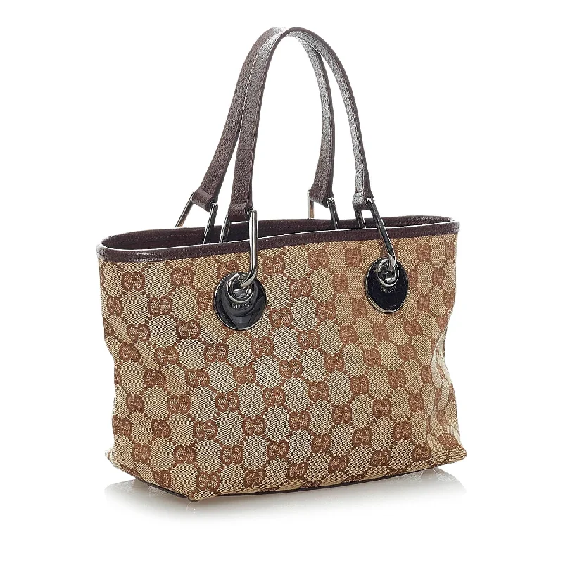 Gucci tote bags for women with a spacious interiorGucci GG Canvas Eclipse Mini Handbag (32069)