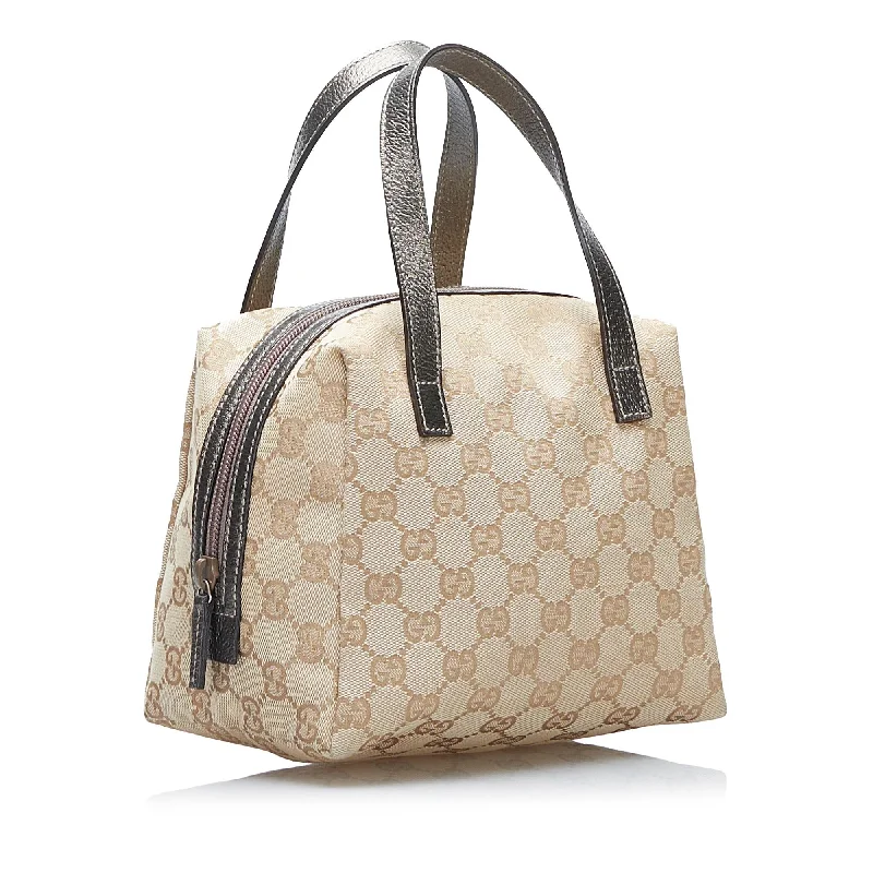 Ladies Gucci shoulder bags with a tassel decorationGucci GG Canvas Mini Dome (SHG-ansTZQ)