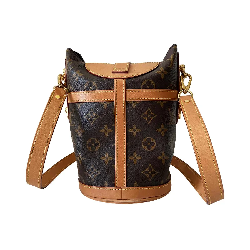 Louis Vuitton bags with a chain - link trim and a leather body for a modern edgeLouis Vuitton Monogram Duffle Bag