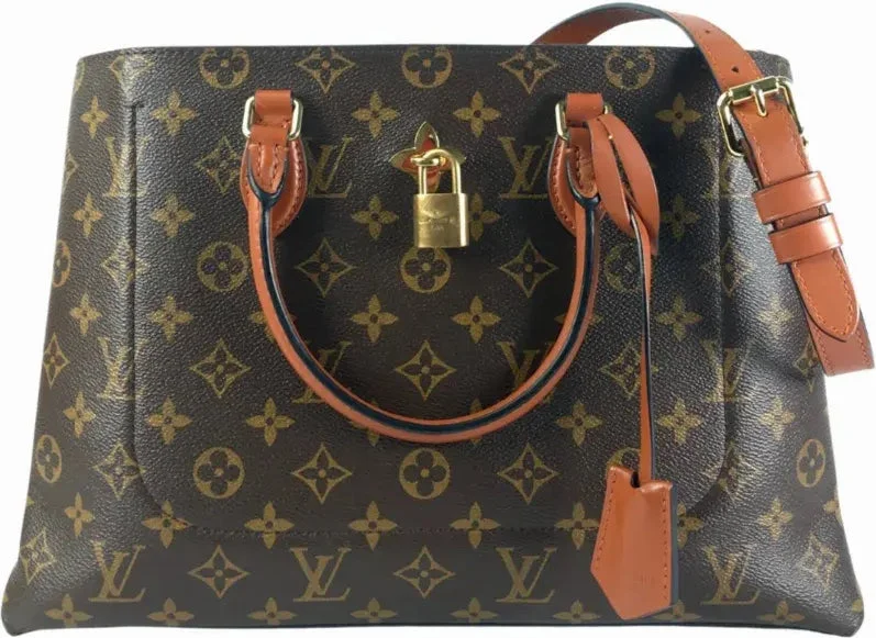 Louis Vuitton bags with a chain - link trim and a leather body for a modern edgeLouis Vuitton Monogram Flower Tote