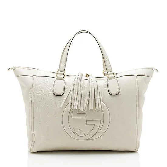 Gucci Marmont bags for women with a contrast - colored interiorGucci Leather Soho Large Zip Tote