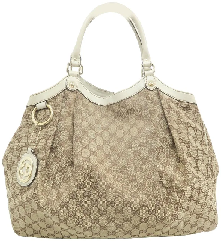 Women Gucci Sylvie bags with a detachable ribbon detailGucci Sukey Large Tote Supreme Sandybrown Canvas Hobo Bag