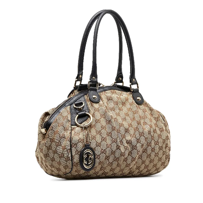 Women Gucci Sylvie bags with a leather - wrapped handleGucci GG Canvas Sukey (SHG-tP1dCU)