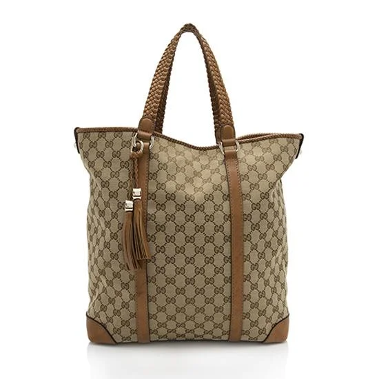 Ladies Gucci shoulder bags with a wide - width strapGucci GG Canvas Marrakech Tote