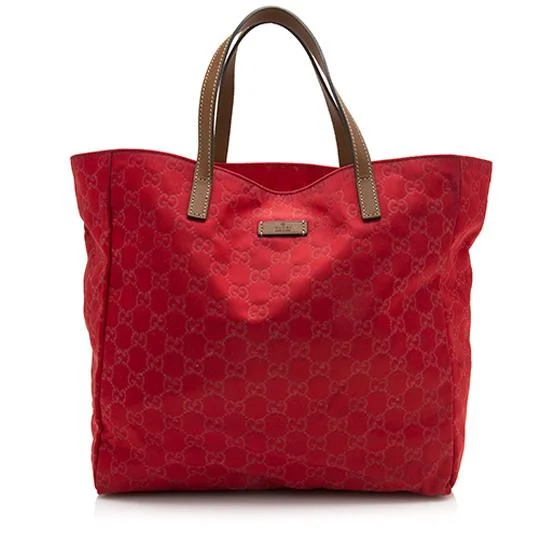 Women Gucci bags with interlocking G hardware for a classic lookGucci GG Nylon Shopping Tote