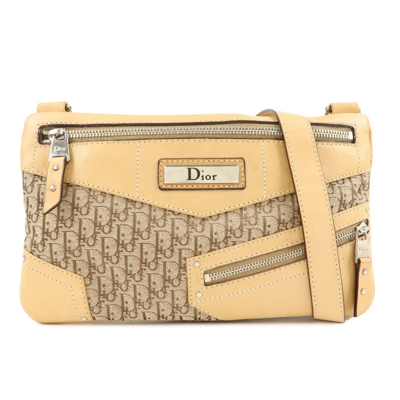 Christian Dior crossbody bags with a front - flap pocket for easy accessChristian Dior Street Chic Trotter Canvas Leather Shoulder Bag