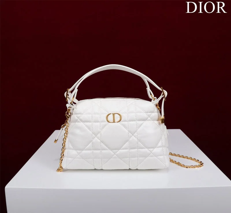 Christian Dior handbags with a snap - button closure and a decorative buckleDior Bag