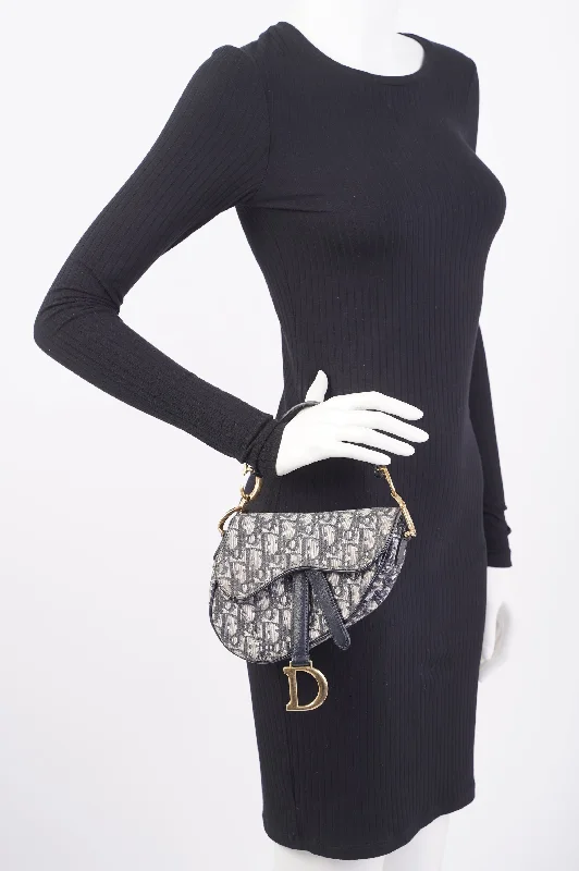 Christian Dior handbags with a back - pocket for quick storageChristian Dior Saddle Bag Oblique Monogram / Navy Canvas Mini