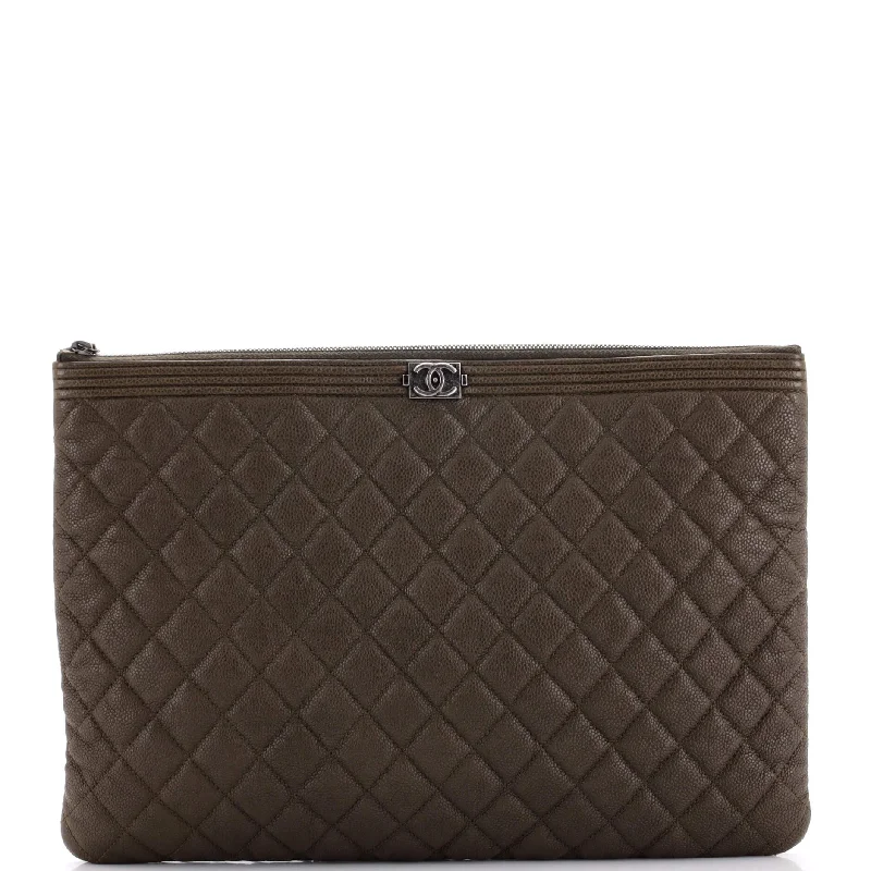 Christian Dior handbags with a snap - button closure and a decorative buckleBoy O Case Clutch Quilted Caviar Large