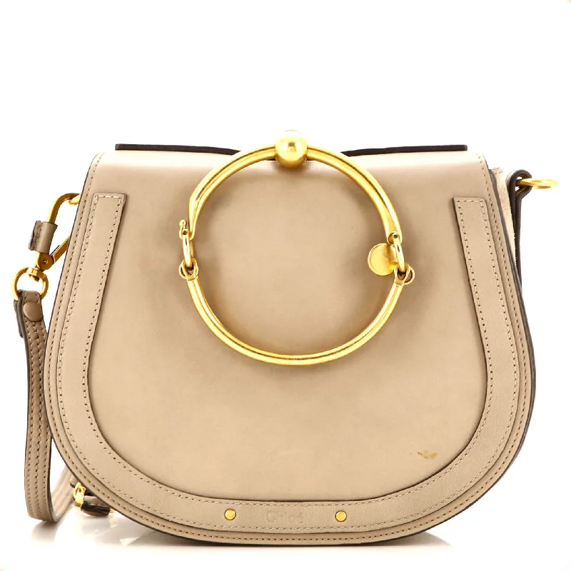 Christian Dior handbags with a snap - button closure and a decorative buckleNile Crossbody Bag Leather Medium