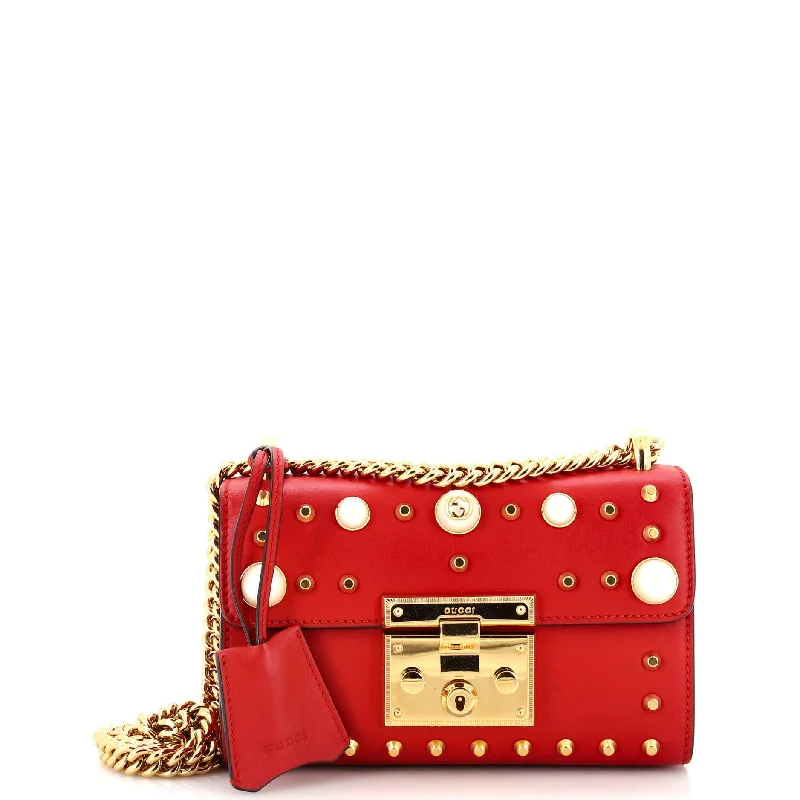 Christian Dior Saddle bags with a studded trim for a bold lookPearly Padlock Shoulder Bag Studded Leather Small